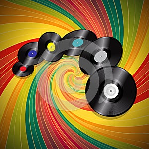 Vinyl records over multicolor vintage swirl background