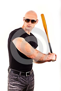 Violence and aggression concept - furious screaming angry man hand holding baseball sport bat