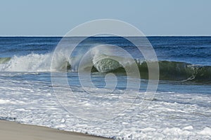 Violent, Choppy Ocean Waves at the Beach photo