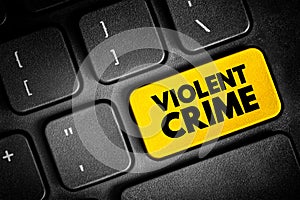 Violent crime - in which an offender or perpetrator uses or threatens to use harmful force upon a victim, text concept button on photo