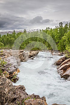 Violent river rushing down a mountain side in northern Sweden.