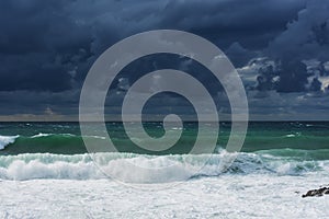 A violent storm in the sea. Beautiful blue storm clouds