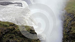 A violent waterfall on a mountain river in Iceland. The close-ups.