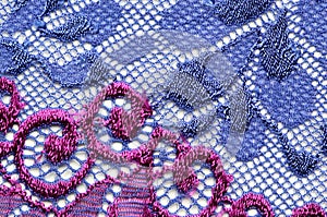 Violet and blue flowers lace material texture macro shot