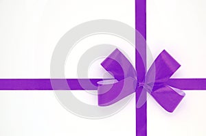 Violet bow isolated over white background