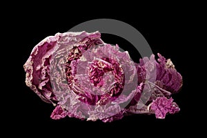 Violet chinese cabbage on black