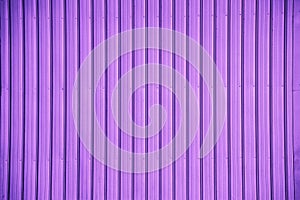 Violet corrugated metal sheet texture background photo