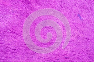 Violet creased colored tissue paper background texture