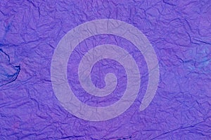 Violet creased colored tissue paper background texture