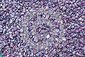 Violet gravel stone floor texture background