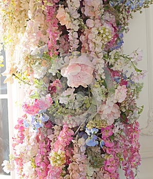 violet lilac, hydrangea, peony flower composition background on the wall