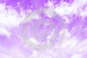 Violet purple sky with white cirro cumulus clouds photo