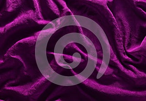 Violet silk texture. Wrinkle fabric background