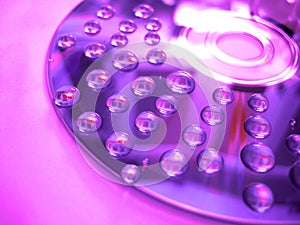 Violet water drop on disk