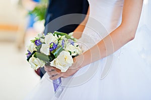 Violet wedding bouquet on hand