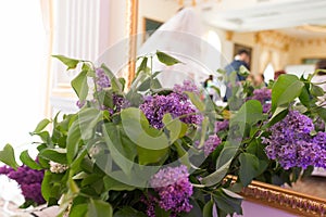 Violet wedding decoration with flowers of lilac