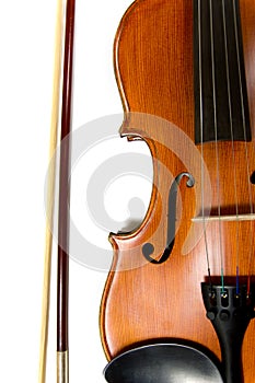 Violin and bow on white