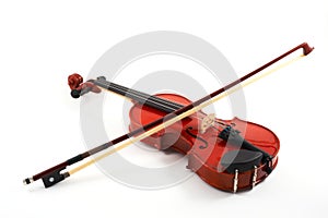 Violin with bow on white backg