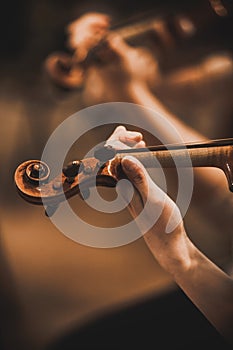 Violin and cellos - closeup on hands - female hands