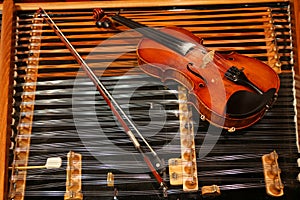 Violin on a cimbalom photo