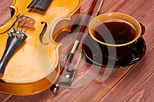 Violin and cup of coffee.