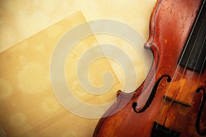 Violin and empty yellow paper