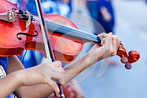 Violin,Hand on the strings of a violin.