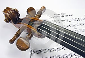 Violin head with sheet music