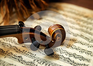 Violin head on sheet music