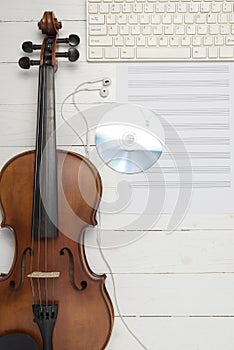 Violin with keyboard computer music paper note and dvd disc