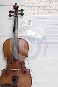 Violin with keyboard computer music paper note and dvd disc