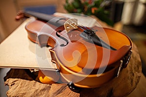 Violin lies on a small table