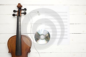 Violin with music paper note and dvd disc