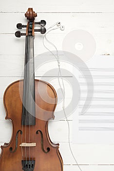 Violin with music paper note and dvd disc