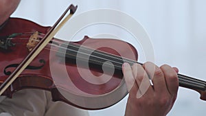 Violin musical instrument violinist hand. Classical musician orchestra music playing