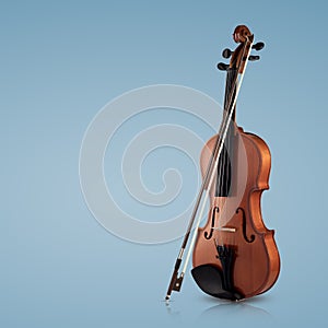 Violin musical instruments of orchestra closeup on blue