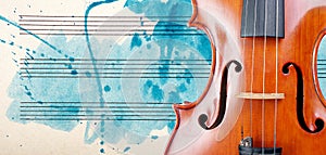 Violin and notes. Melody concept. Photo of old music sheet in blue watercolor paint. Classical music concept. Abstract blue waterc