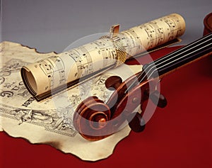 Violin and old musical sheets