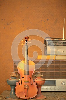 Violin and old radio in vintage style