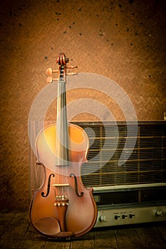 Violin and old radio in vintage style