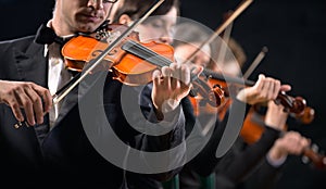 Violin orchestra performing