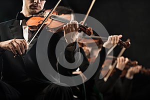 Violin orchestra performing