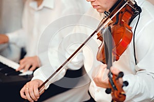 Violin playing viola musician. Man violinist classical musical instrument  fiddle playing on wedding