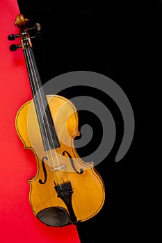 Violin on a red and black background