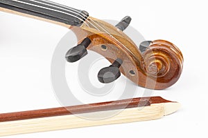 Violin Scroll with Tuning Pegs and Fiddle Bow