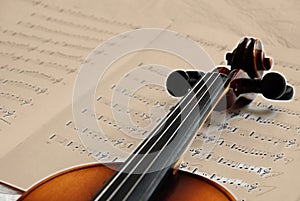 Violin on sepia music paper