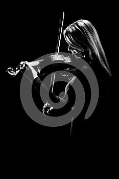 Violinist isolated on black