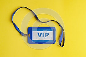 Vip badge on yellow background, top view