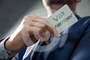 VIP member card holded by an man