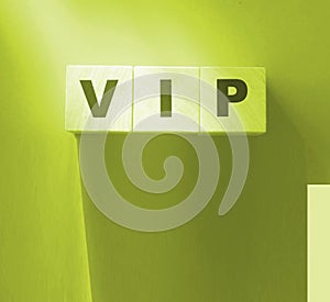 VIP Very Important Person text on wooden cubes on red. Business concept